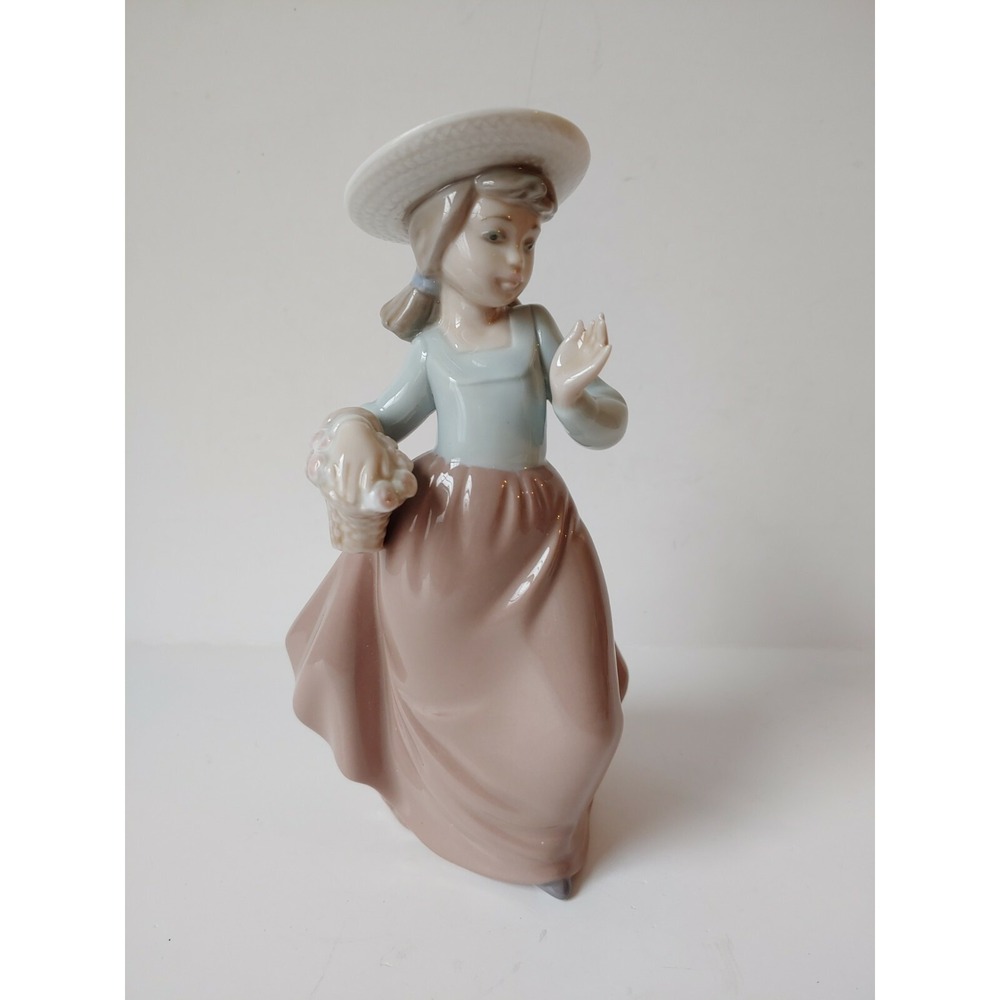 NAO lladro porcelain figurine girl with flower basket
